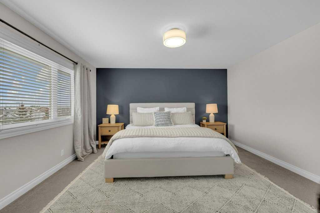 23 Bowman Circle, Sylvan Lake, AB - Indoor Photo Showing Bedroom