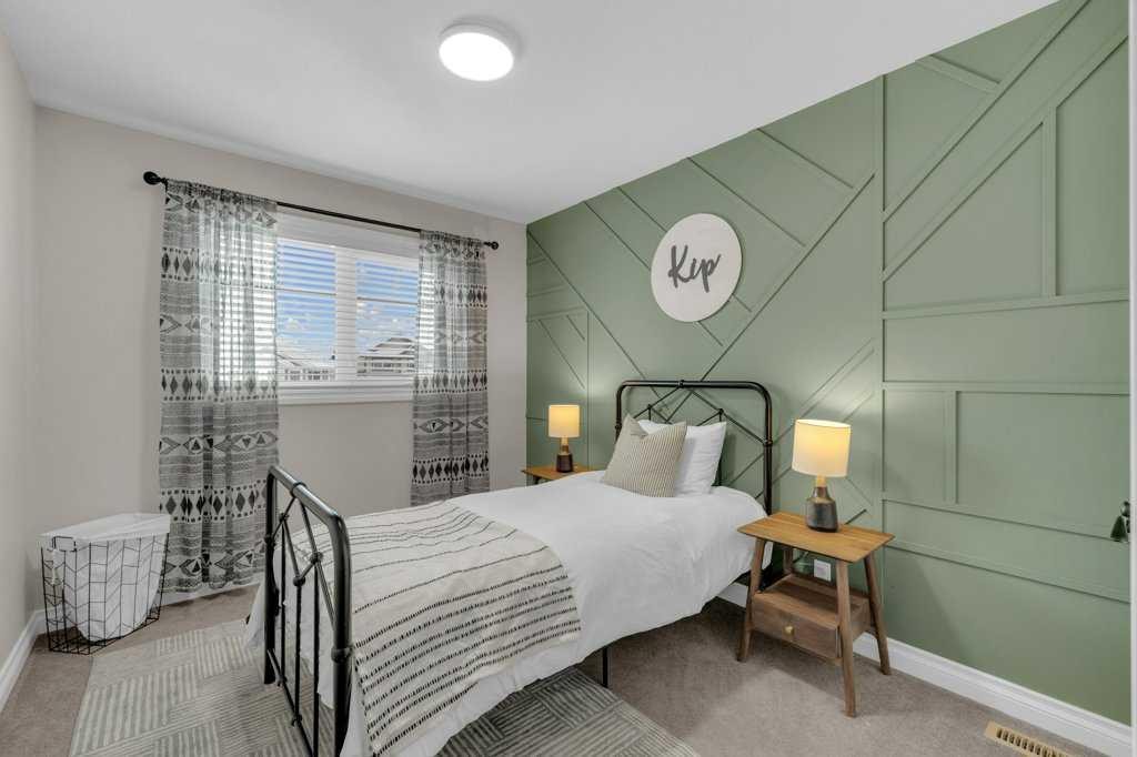 23 Bowman Circle, Sylvan Lake, AB - Indoor Photo Showing Bedroom