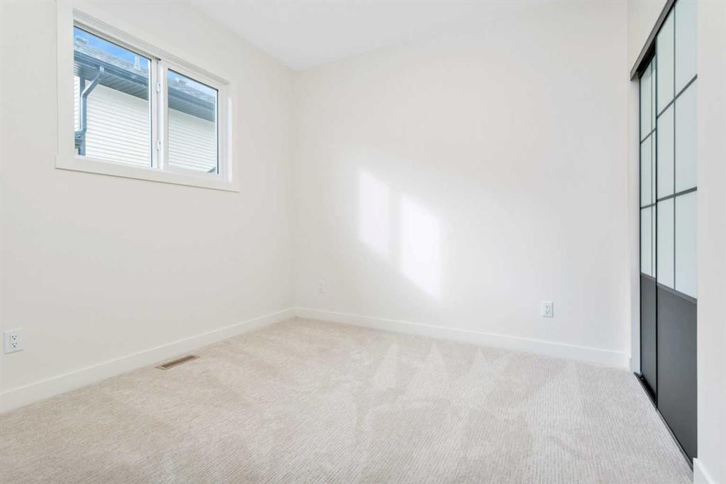 77 Maclean Close, Blackfalds, AB - Indoor Photo Showing Other Room