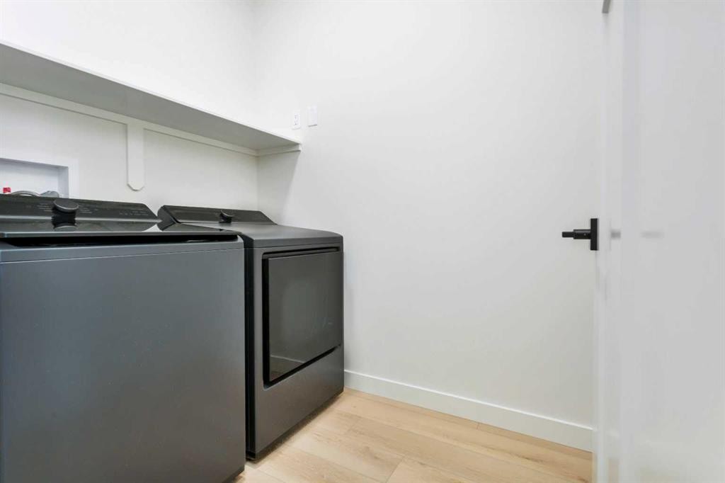77 Maclean Close, Blackfalds, AB - Indoor Photo Showing Laundry Room