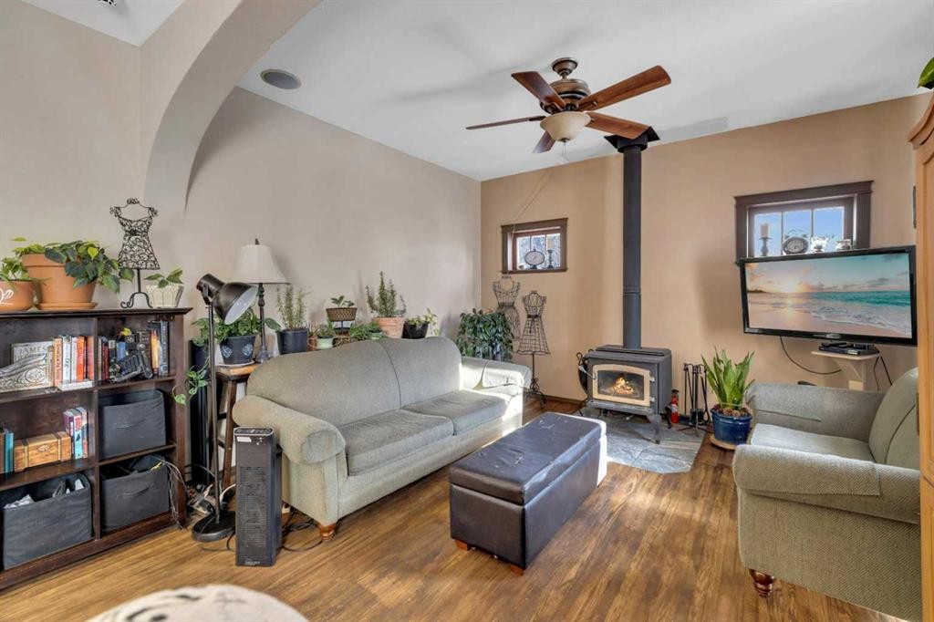 6312 48 Ave, Ponoka, AB - Indoor Photo Showing Living Room With Fireplace