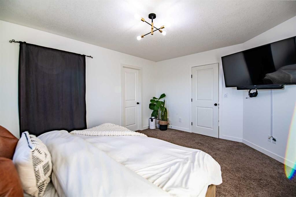 53 Portway Close, Blackfalds, AB - Indoor Photo Showing Bedroom