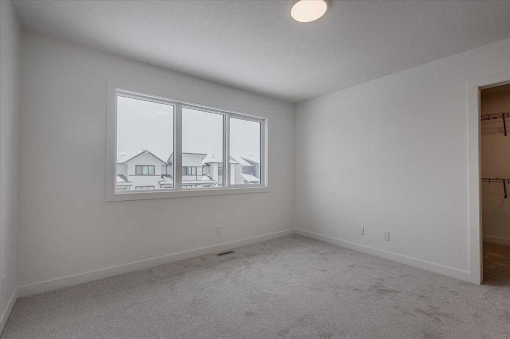 32 Inglis Crescent, Sylvan Lake, AB - Indoor Photo Showing Other Room