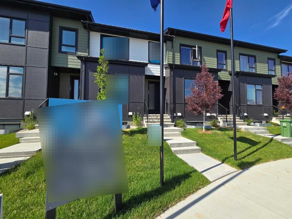 231 Vantage Drive, Cochrane, AB - Outdoor With Facade