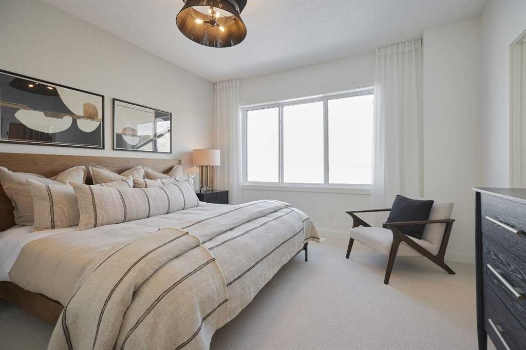 58 Raven Point Se, Calgary, AB - Indoor Photo Showing Bedroom