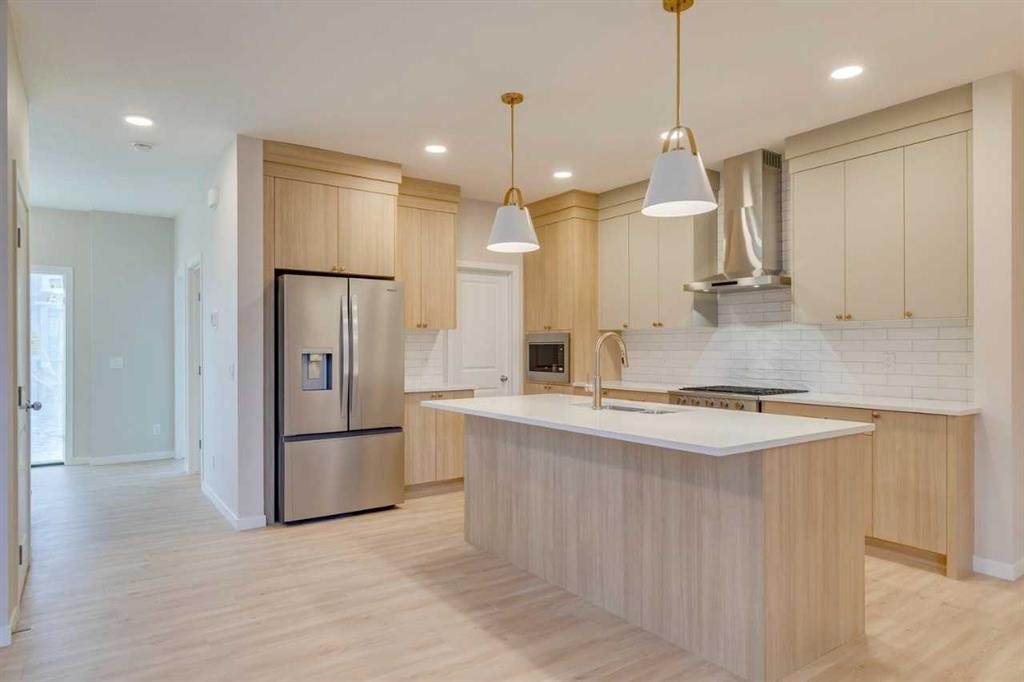 82 Alpine Common Sw, Calgary, AB - Indoor Photo Showing Kitchen With Upgraded Kitchen
