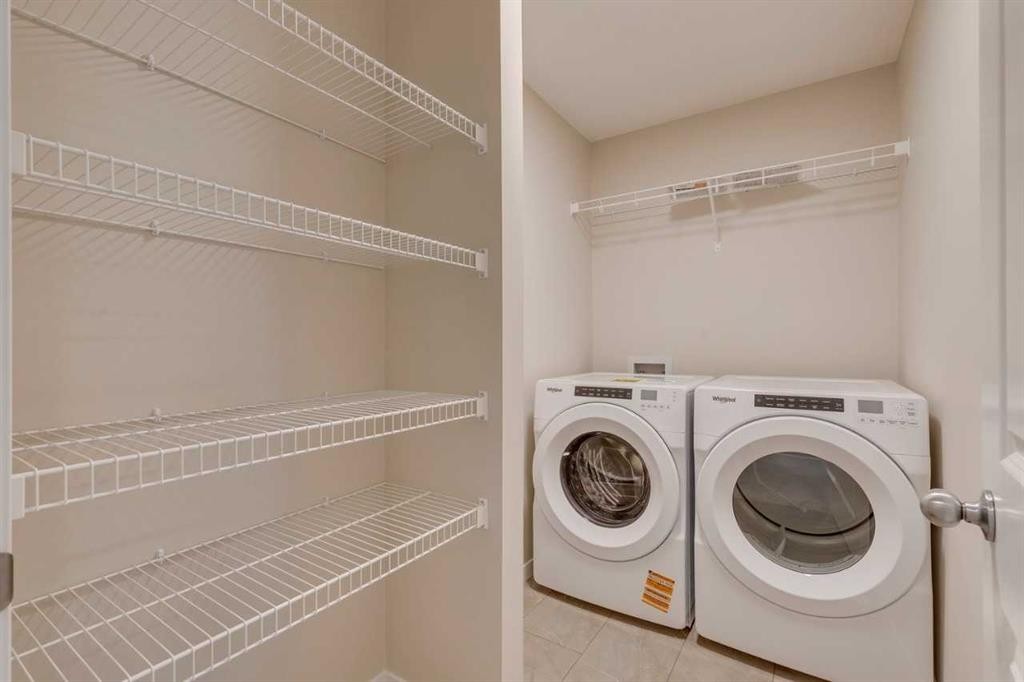 82 Alpine Common Sw, Calgary, AB - Indoor Photo Showing Laundry Room