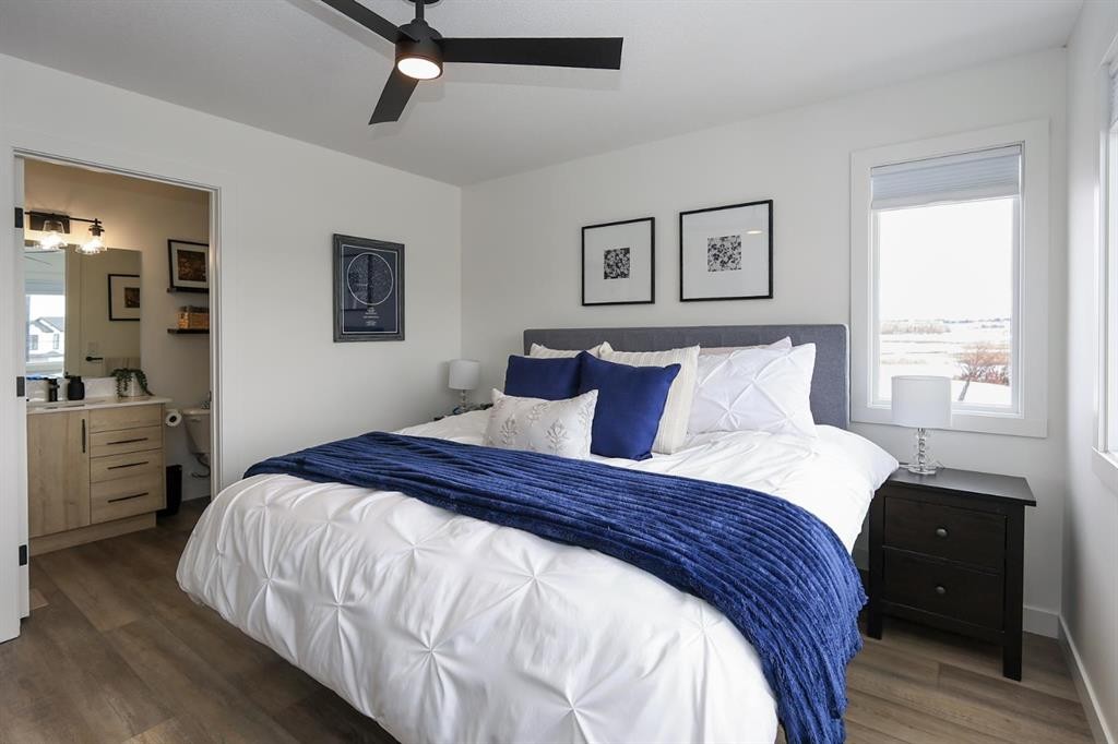 E-2 Evergreen Way, Red Deer, AB - Indoor Photo Showing Bedroom