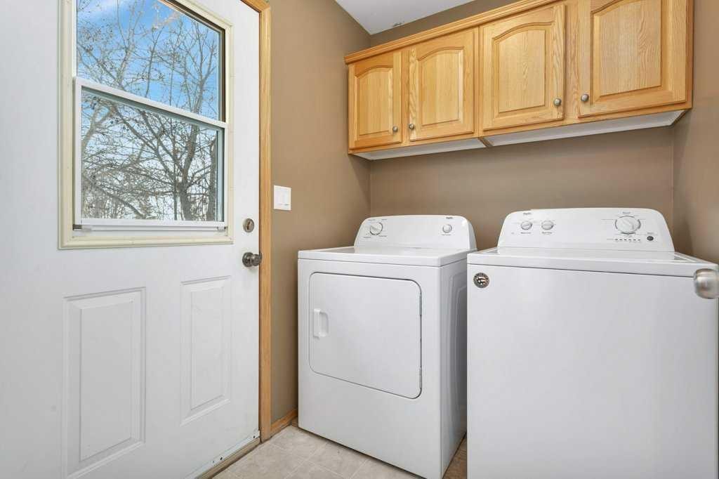 220 Deschner Close, Red Deer, AB - Indoor Photo Showing Laundry Room