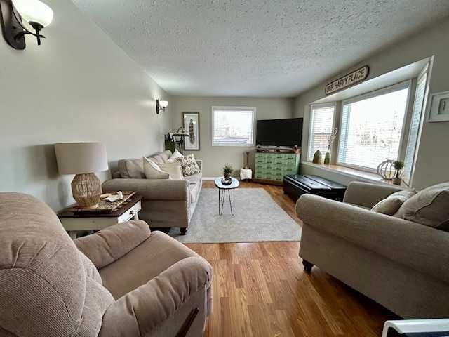 502 Plover Close, Pelican Point, AB - Indoor Photo Showing Living Room