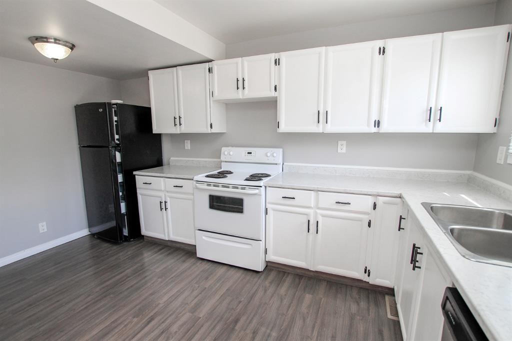 36 Mcblane Close, Red Deer, AB - Indoor Photo Showing Kitchen With Double Sink