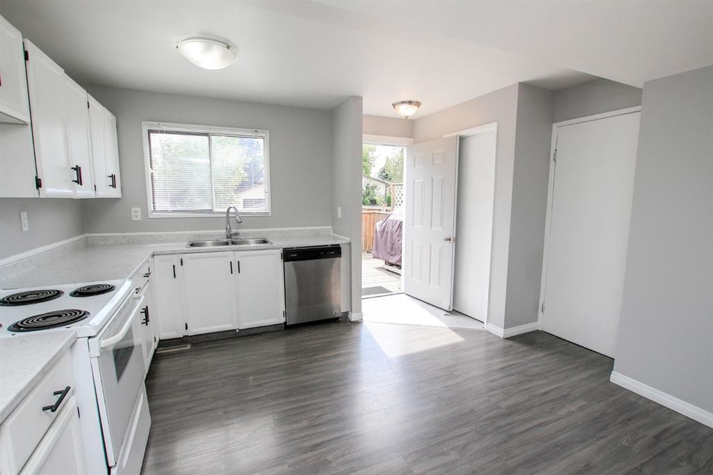 36 Mcblane Close, Red Deer, AB - Indoor Photo Showing Kitchen With Double Sink