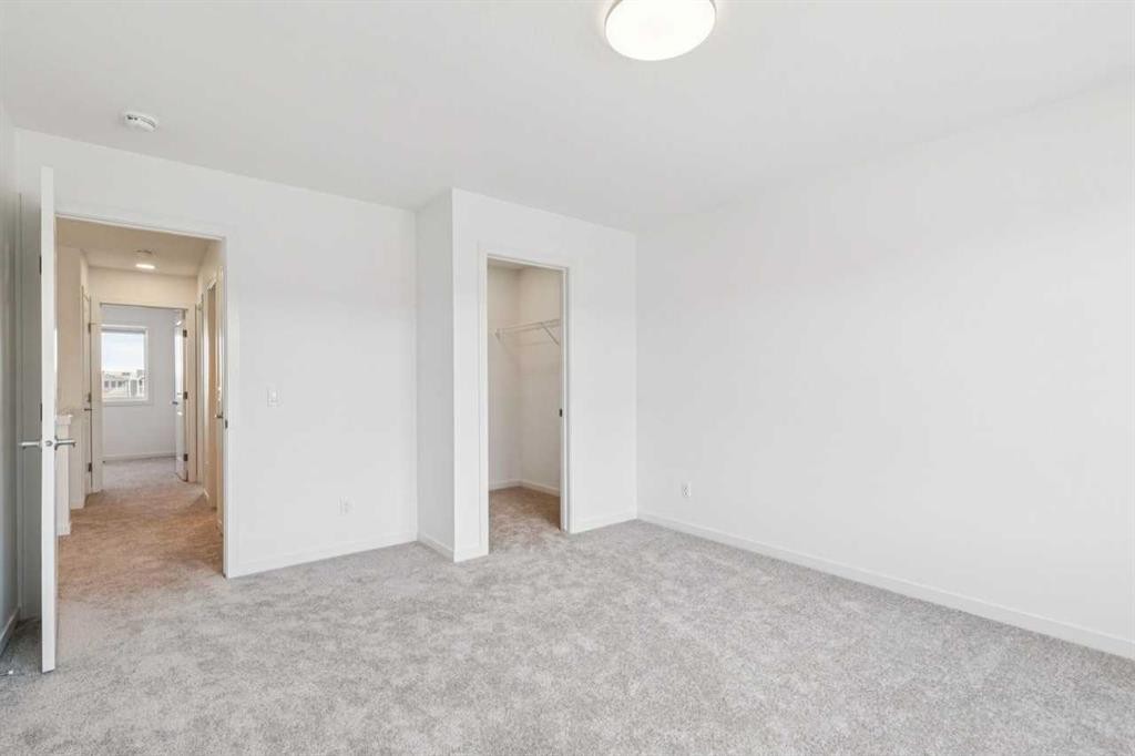 15 Emberside Park, Cochrane, AB - Indoor Photo Showing Other Room