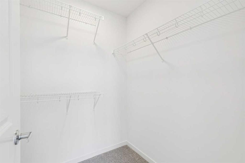 15 Emberside Park, Cochrane, AB - Indoor With Storage