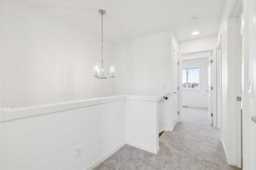 15 Emberside Park, Cochrane, AB - Indoor Photo Showing Other Room