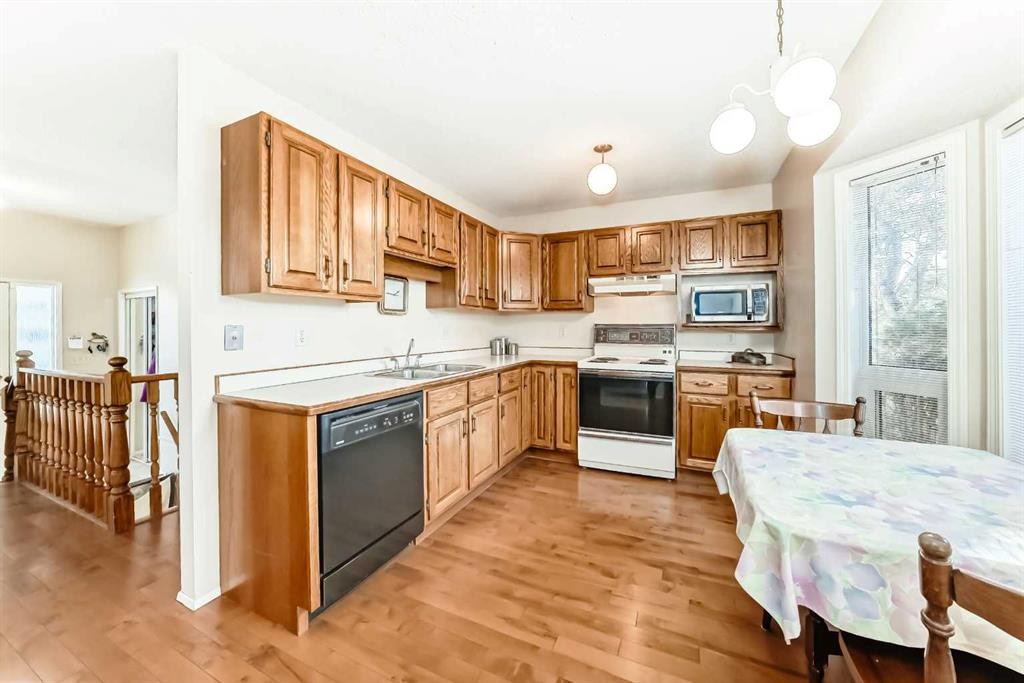 3 Rutherford Close, Red Deer, AB - Indoor Photo Showing Kitchen With Double Sink