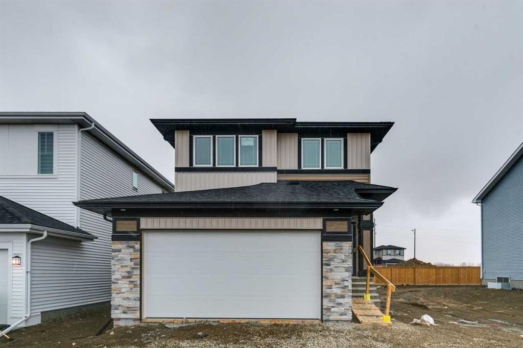 85 Southborough Square, Cochrane, AB - Outdoor With Exterior