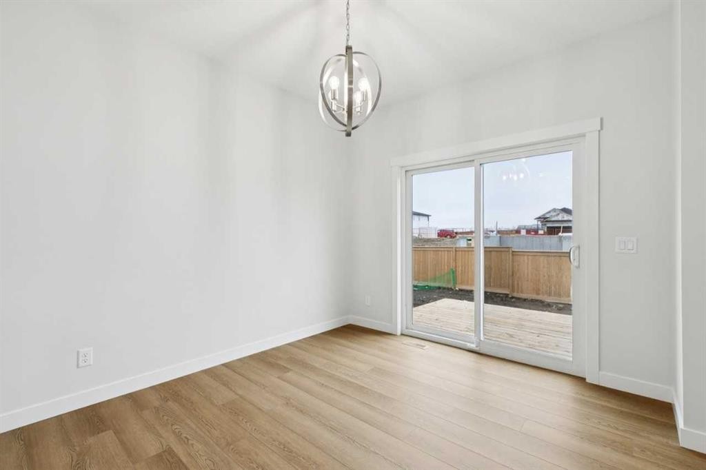 85 Southborough Square, Cochrane, AB - Indoor Photo Showing Other Room