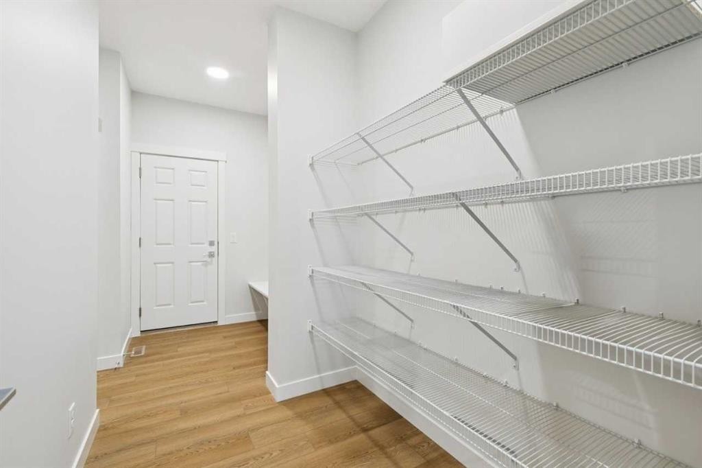 85 Southborough Square, Cochrane, AB - Indoor With Storage