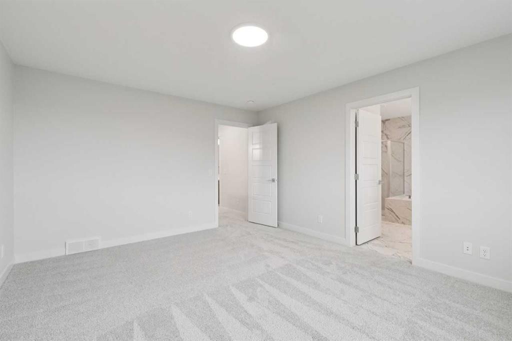 85 Southborough Square, Cochrane, AB - Indoor Photo Showing Other Room