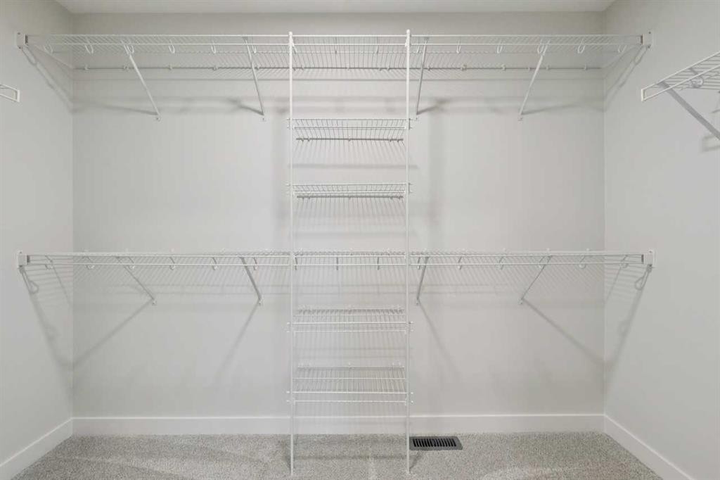 85 Southborough Square, Cochrane, AB - Indoor With Storage