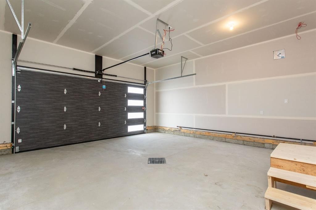 17 Tindale Place, Red Deer, AB - Indoor Photo Showing Garage