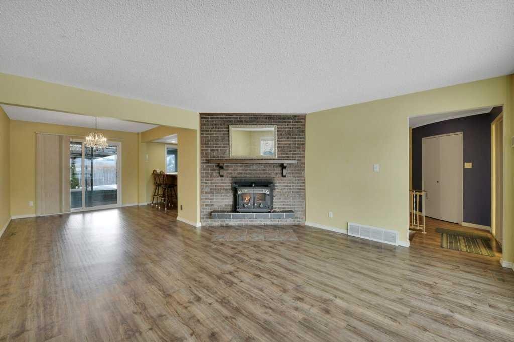 37 Wilson Crescent, Red Deer, AB - Indoor Photo Showing Living Room With Fireplace