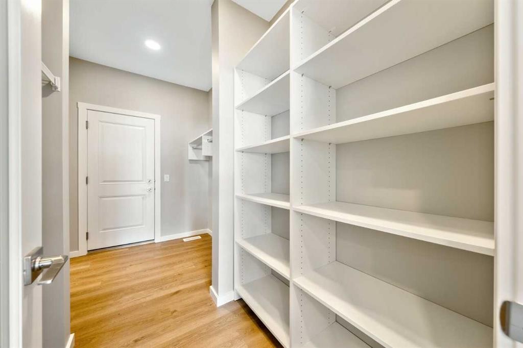 370 Heritage Boulevard, Cochrane, AB - Indoor With Storage