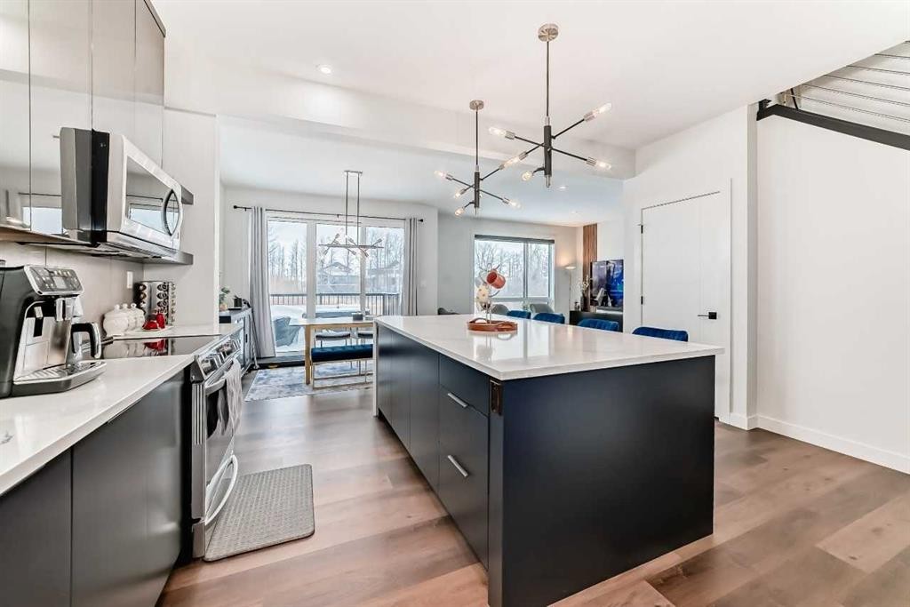 153 Emerald Drive, Red Deer, AB - Indoor Photo Showing Kitchen With Upgraded Kitchen