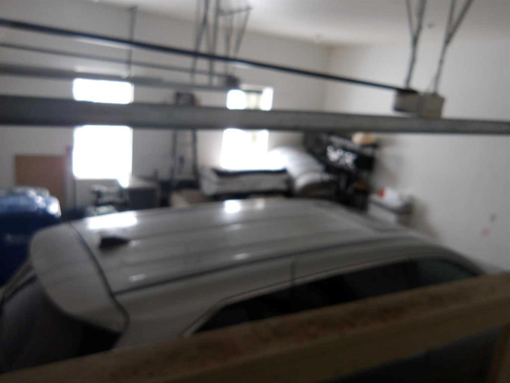 39 Ashley Close, Red Deer, AB - Indoor Photo Showing Garage