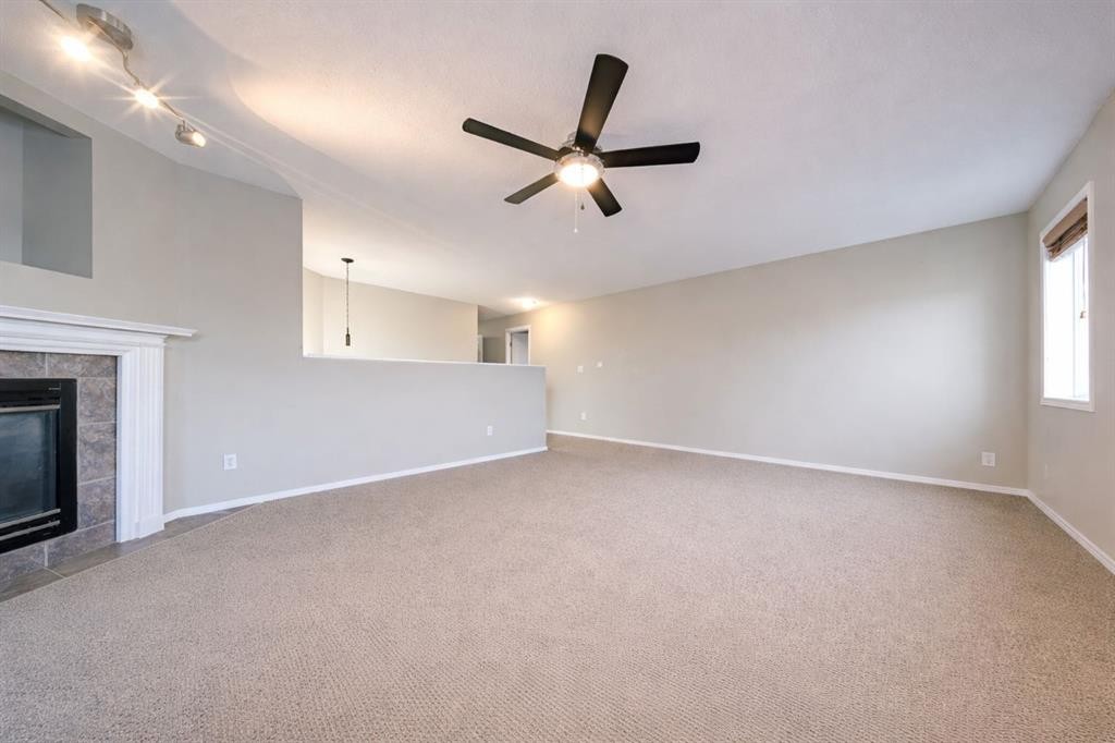 11 Inglis Crescent, Red Deer, AB - Indoor With Fireplace