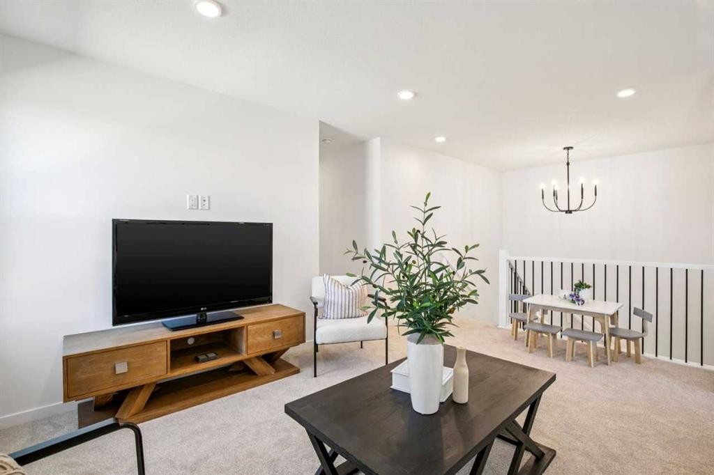98 Creekstone Place Sw, Calgary, AB - Indoor Photo Showing Living Room