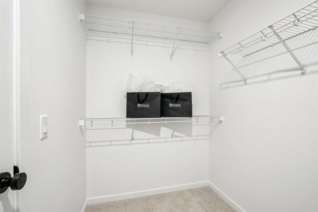 98 Creekstone Place Sw, Calgary, AB - Indoor With Storage