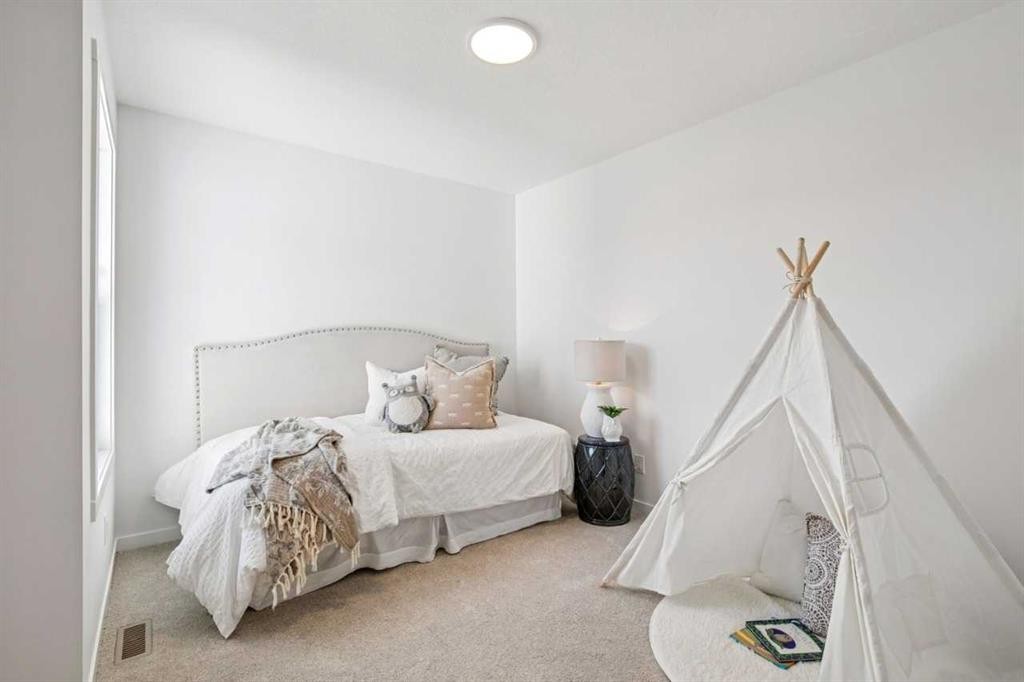 98 Creekstone Place Sw, Calgary, AB - Indoor Photo Showing Bedroom