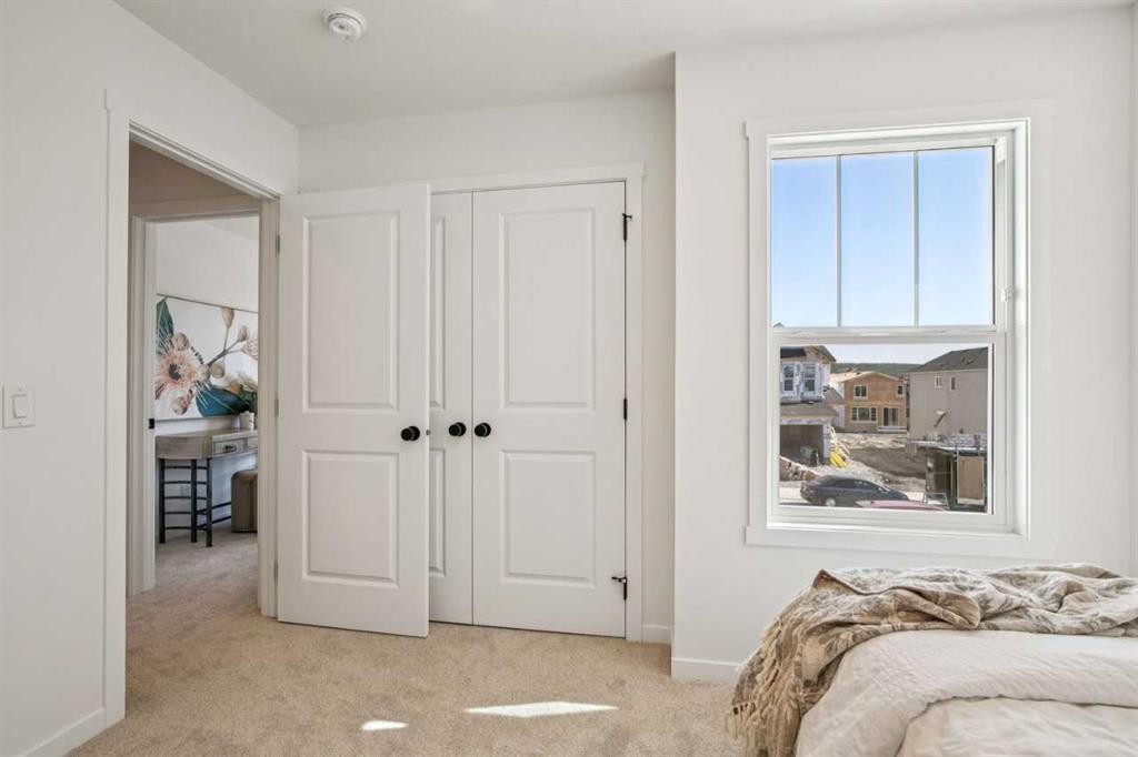 98 Creekstone Place Sw, Calgary, AB - Indoor Photo Showing Bedroom