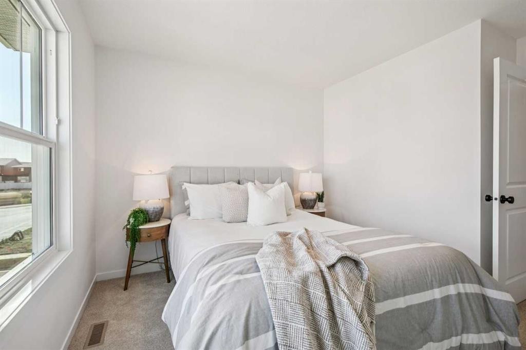98 Creekstone Place Sw, Calgary, AB - Indoor Photo Showing Bedroom
