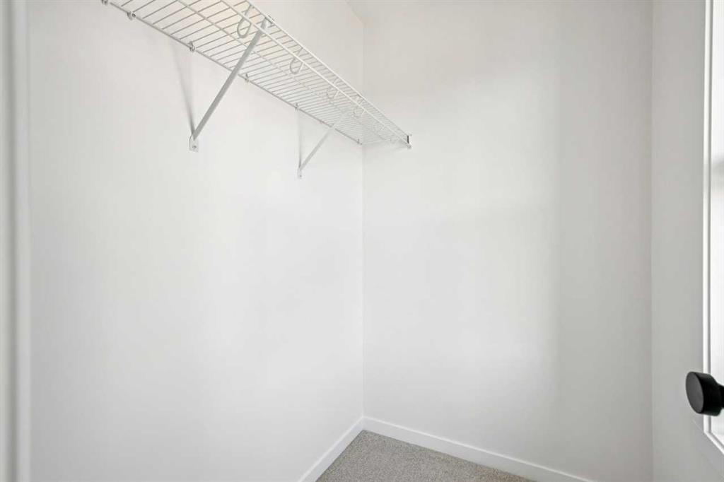 98 Creekstone Place Sw, Calgary, AB - Indoor With Storage