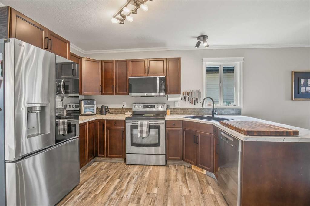 44 White Avenue, Red Deer, AB - Indoor Photo Showing Kitchen With Stainless Steel Kitchen