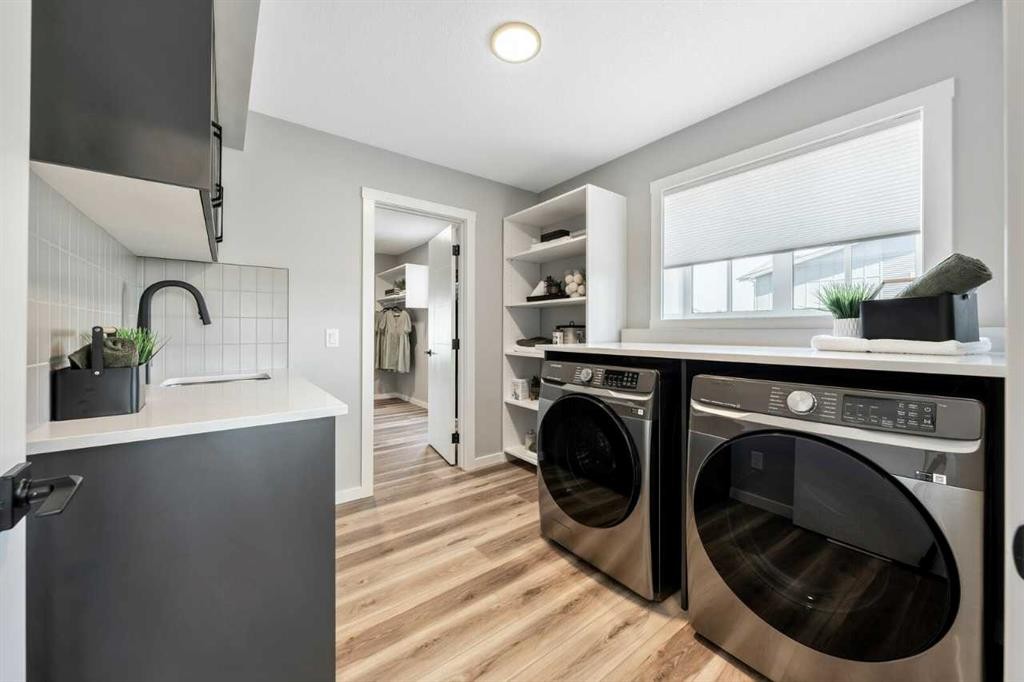 56 Osprey Hill Place Sw, Calgary, AB - Indoor Photo Showing Laundry Room