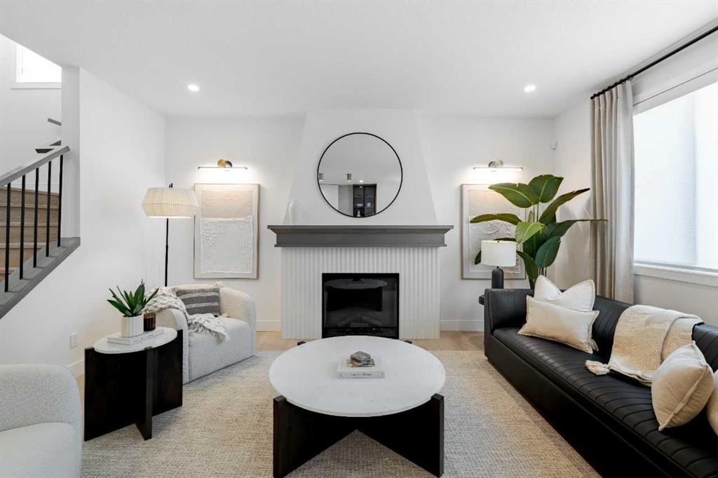 236 Amblestone Crescent Nw, Calgary, AB - Indoor Photo Showing Living Room With Fireplace