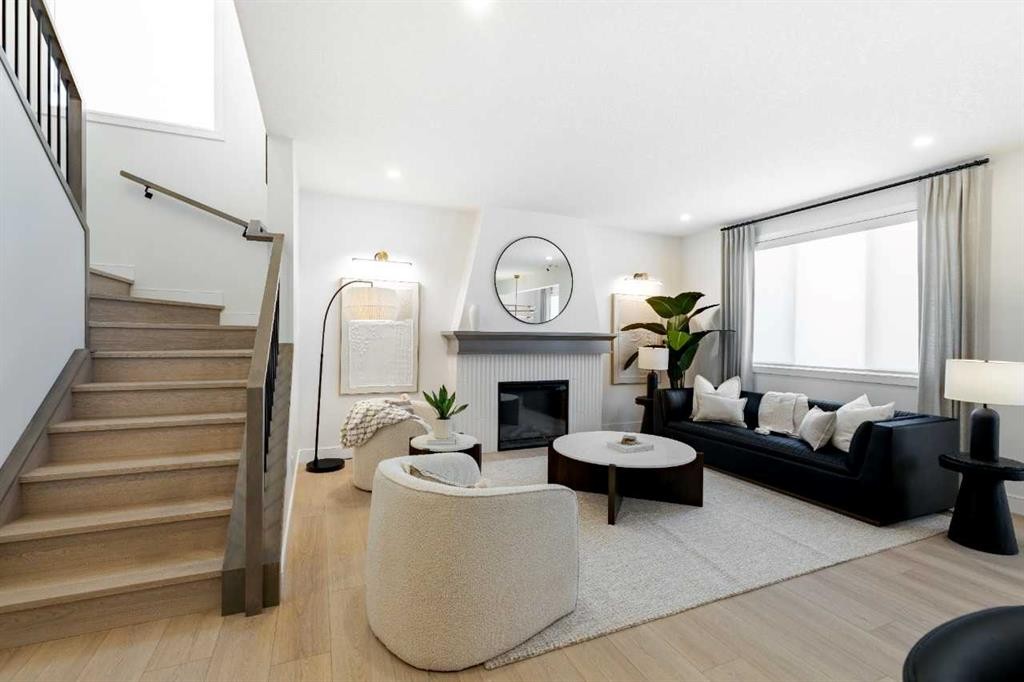 236 Amblestone Crescent Nw, Calgary, AB - Indoor Photo Showing Other Room With Fireplace