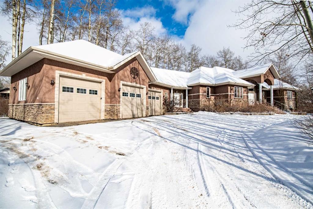 295 Jarvis Glen Close, Jarvis Bay, AB - Outdoor With Deck Patio Veranda With Facade