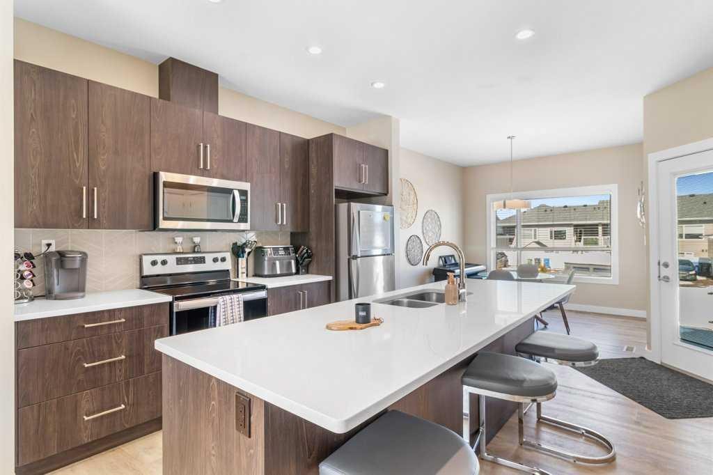 56 Evergreen, Red Deer, AB - Indoor Photo Showing Kitchen With Double Sink With Upgraded Kitchen