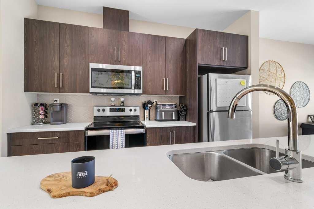 56 Evergreen, Red Deer, AB - Indoor Photo Showing Kitchen With Double Sink