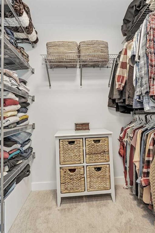 52 Iron Gate Boulevard, Sylvan Lake, AB - Indoor With Storage