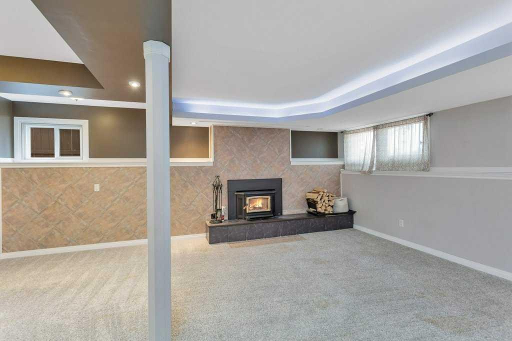 7 Nellis Avenue, Red Deer, AB - Indoor With Fireplace