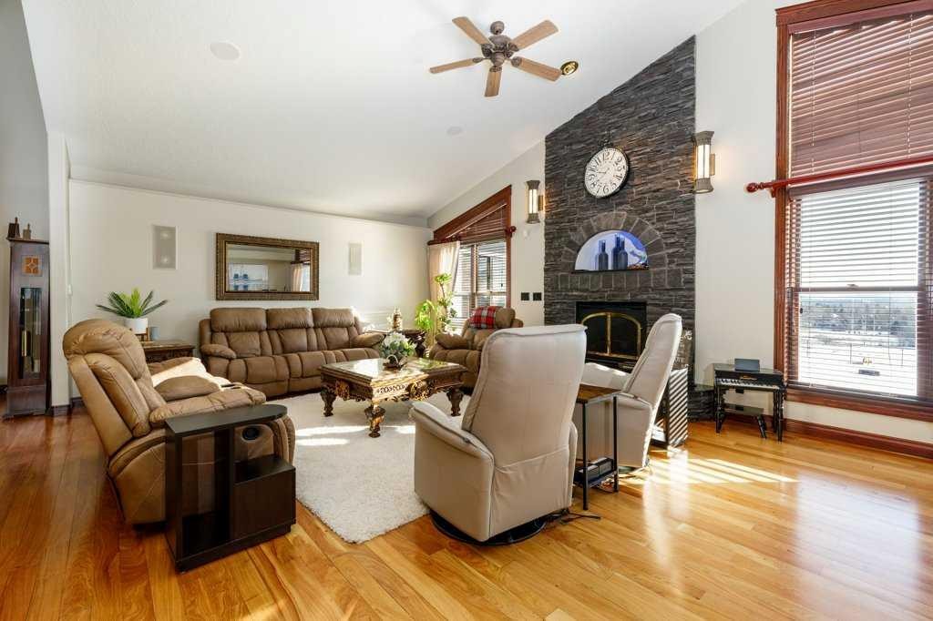 85 Oberlin Avenue, Red Deer, AB - Indoor Photo Showing Living Room With Fireplace