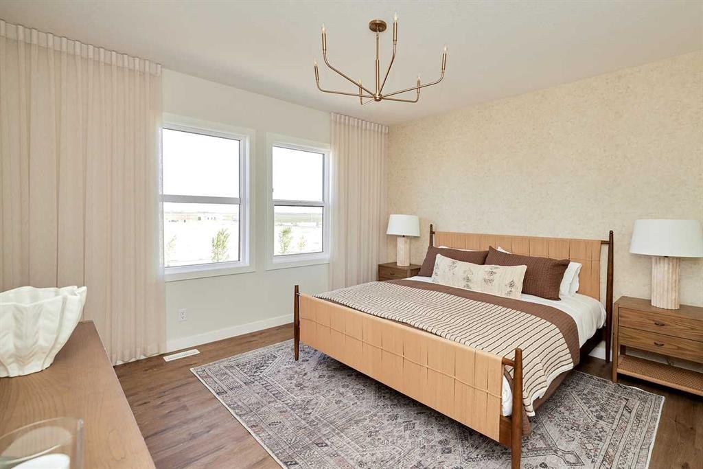 9 Shawnee Passage Sw, Calgary, AB - Indoor Photo Showing Bedroom