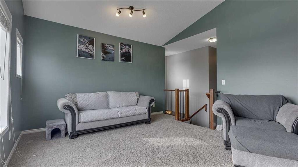 148 Valley Crescent, Blackfalds, AB - Indoor Photo Showing Living Room