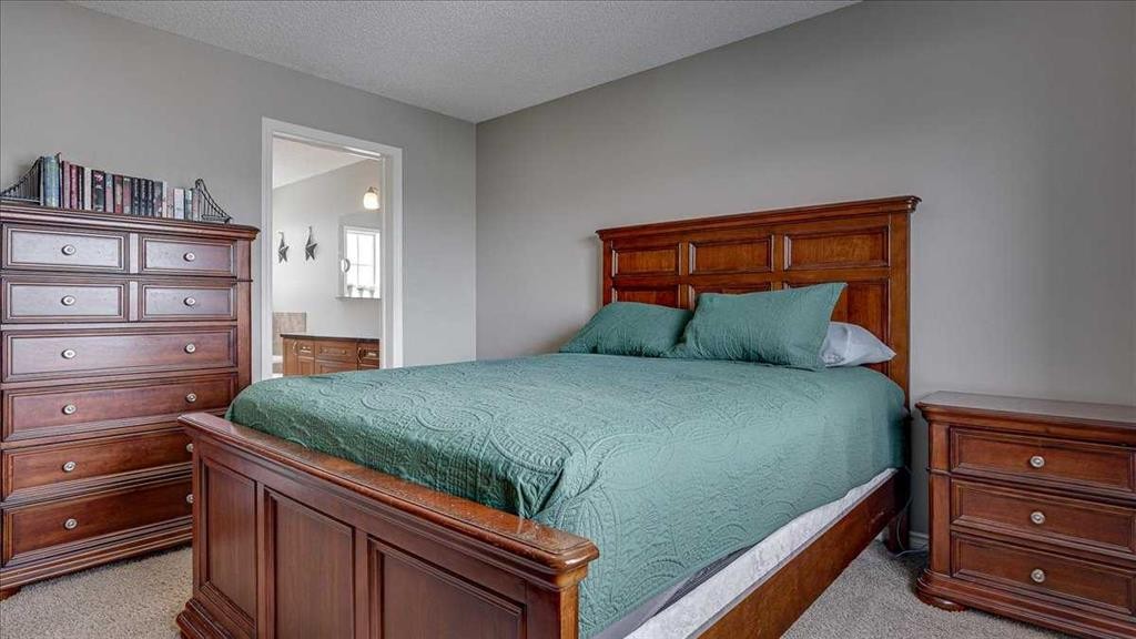 148 Valley Crescent, Blackfalds, AB - Indoor Photo Showing Bedroom